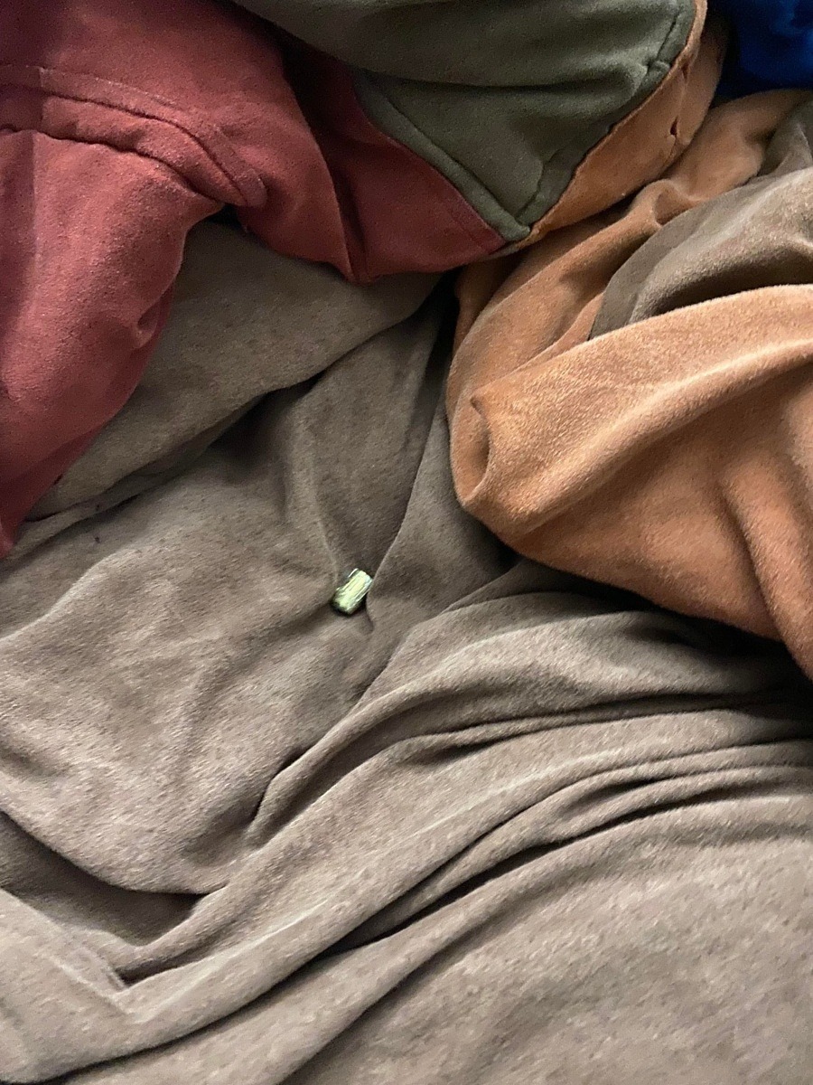 Bullet on bed sheets